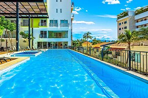 Bright Coastal Condo With Pool Access, Private Balcony & Fast Wi-fi