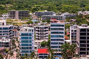 Modern Condo With Infinity Pool, Wifi, Plunge spa & Ocean-view Balcony