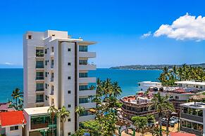 Modern Condo With Infinity Pool, Wifi, Plunge spa & Ocean-view Balcony