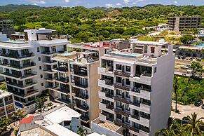 Modern Condo With Infinity Pool, Wifi, Plunge spa & Ocean-view Balcony