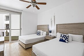 Chic Coastal Condo With Private Balcony, Pool Access & Steps to the Be