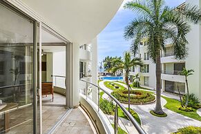Chic Coastal Condo With Private Balcony, Pool Access & Steps to the Be