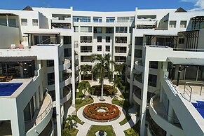 Chic Coastal Condo With Private Balcony, Pool Access & Steps to the Be
