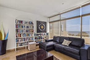 Chic Coastal Condo With Private Balcony, Pool Access & Steps to the Be