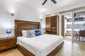 Chic Coastal Condo With Private Balcony, Pool Access & Steps to the Be