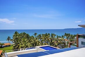 Chic Coastal Condo With Private Balcony, Pool Access & Steps to the Be