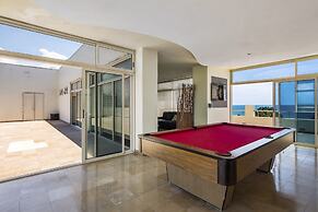 Chic Coastal Condo With Private Balcony, Pool Access & Steps to the Be