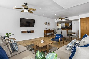 Chic Coastal Condo With Private Balcony, Pool Access & Steps to the Be