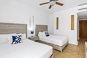 Chic Coastal Condo With Private Balcony, Pool Access & Steps to the Be