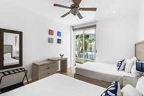 Chic Coastal Condo With Private Balcony, Pool Access & Steps to the Be