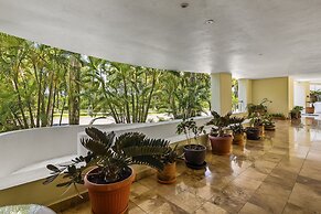 Chic Coastal Condo With Private Balcony, Pool Access & Steps to the Be
