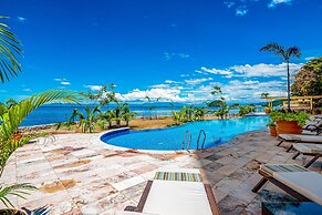 Inviting Waterfront Condo With Amazing Pool, Balcony & W/D