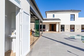 Palm Breeze Villa by Fidalsa