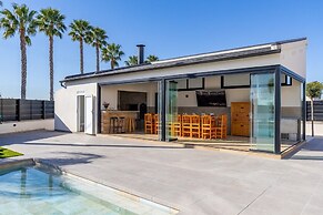 Palm Breeze Villa by Fidalsa