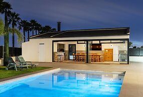 Palm Breeze Villa by Fidalsa