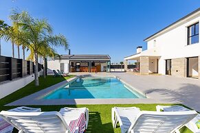 Palm Breeze Villa by Fidalsa