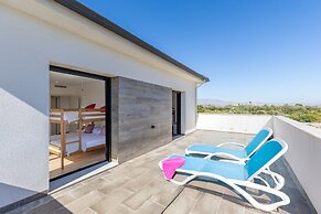 Palm Breeze Villa by Fidalsa