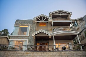 ELIVAAS privé The Royce Orchid 4BHK