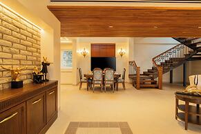 ELIVAAS privé The Royce Orchid 4BHK