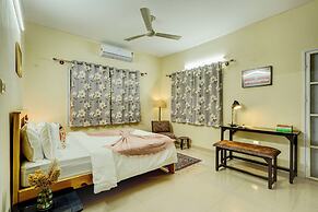Alaya Stays Saffron Breeze Apartment