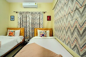 Alaya Stays Saffron Breeze Apartment