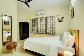 Alaya Stays Saffron Breeze Apartment