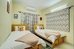 Alaya Stays Saffron Breeze Apartment