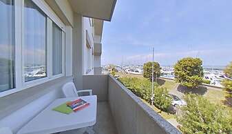 Practical Coastal Apartment With a Great View
