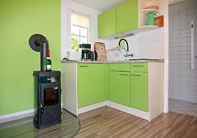 Ferienhaus mit Kamin am Achterwasser in Lutow