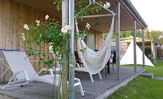 Ferienhaus mit Kamin am Achterwasser in Lutow