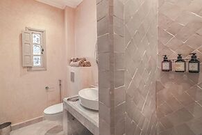 Riad Della