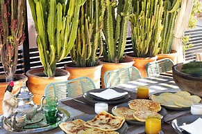 Riad Della