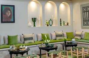 Riad Della