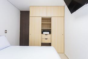 Hotel Distrito 70 Living