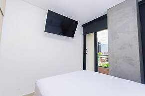 Hotel Distrito 70 Living