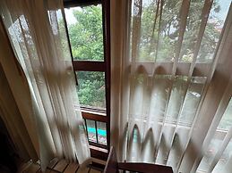 403 Serene Teak Boutique Apartments