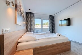 Aparthotel Plat