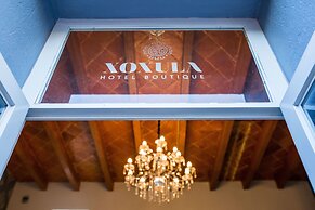 Xoxula by Inmense