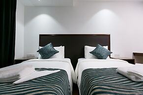 Belllo Hotel JB Central