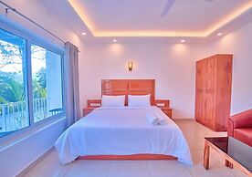 Ice Cliff Munnar by VOYE HOMES