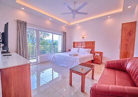 Ice Cliff Munnar by VOYE HOMES
