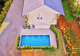 Ice Cliff Munnar by VOYE HOMES