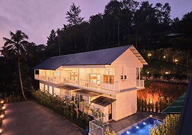 Ice Cliff Munnar by VOYE HOMES