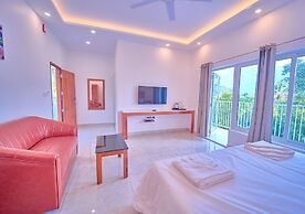 Ice Cliff Munnar by VOYE HOMES