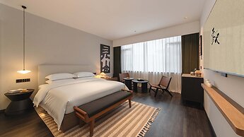 Wuye WOO YEAH Tangchi Hotel