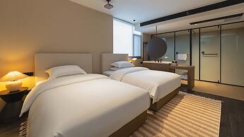Wuye WOO YEAH Tangchi Hotel