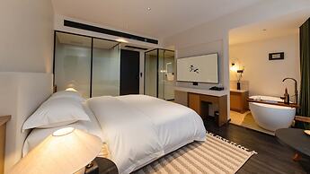 Wuye WOO YEAH Tangchi Hotel
