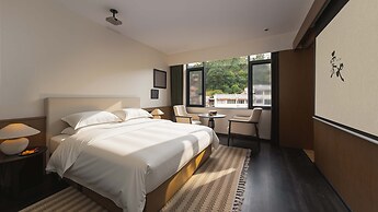 Wuye WOO YEAH Tangchi Hotel