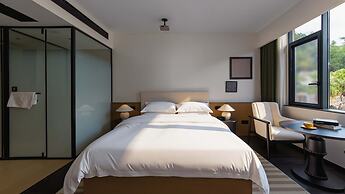 Wuye WOO YEAH Tangchi Hotel