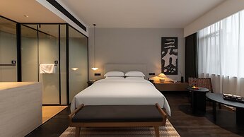 Wuye WOO YEAH Tangchi Hotel